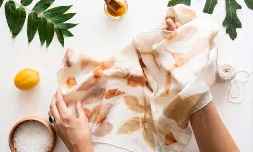 Flat lay making of a pigmented cloth with natural colors arrangement