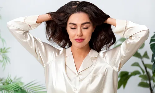 Woman doing herself a scalp massage