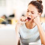 Why do we feel sleepy after a heavy meal?