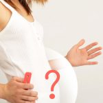 What exactly is a false pregnancy and why does it occur? 