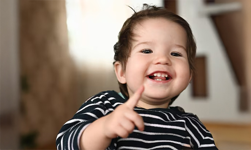 A kid with Baby teeth