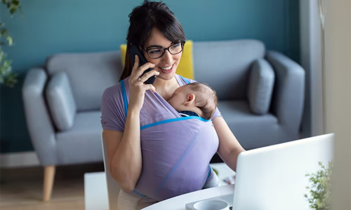 A-woman-with-her-baby-in-a-carrier