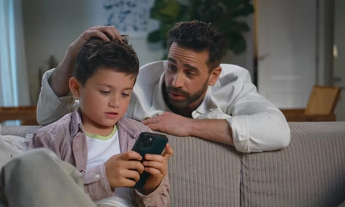 Father talking with his son during a supportive family conversation