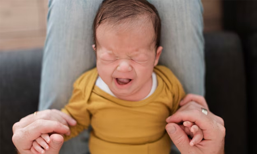 overstimulated baby crying