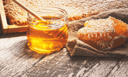 Honey in the jar and honey comb.